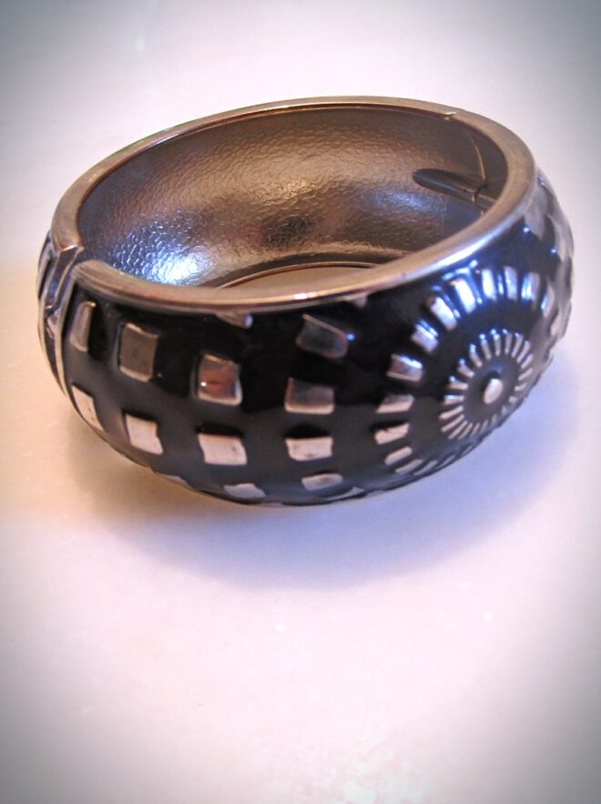 Elegant Black and Metal Combo Bracelet With Unique Flowers Design