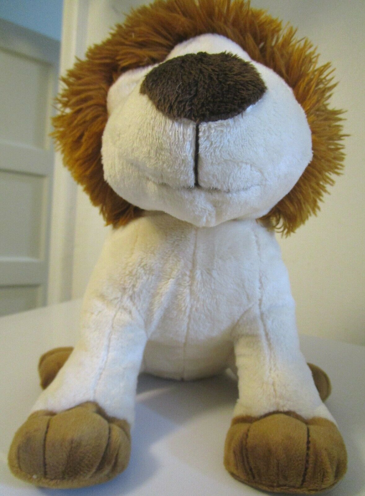 small stuffed lion toy